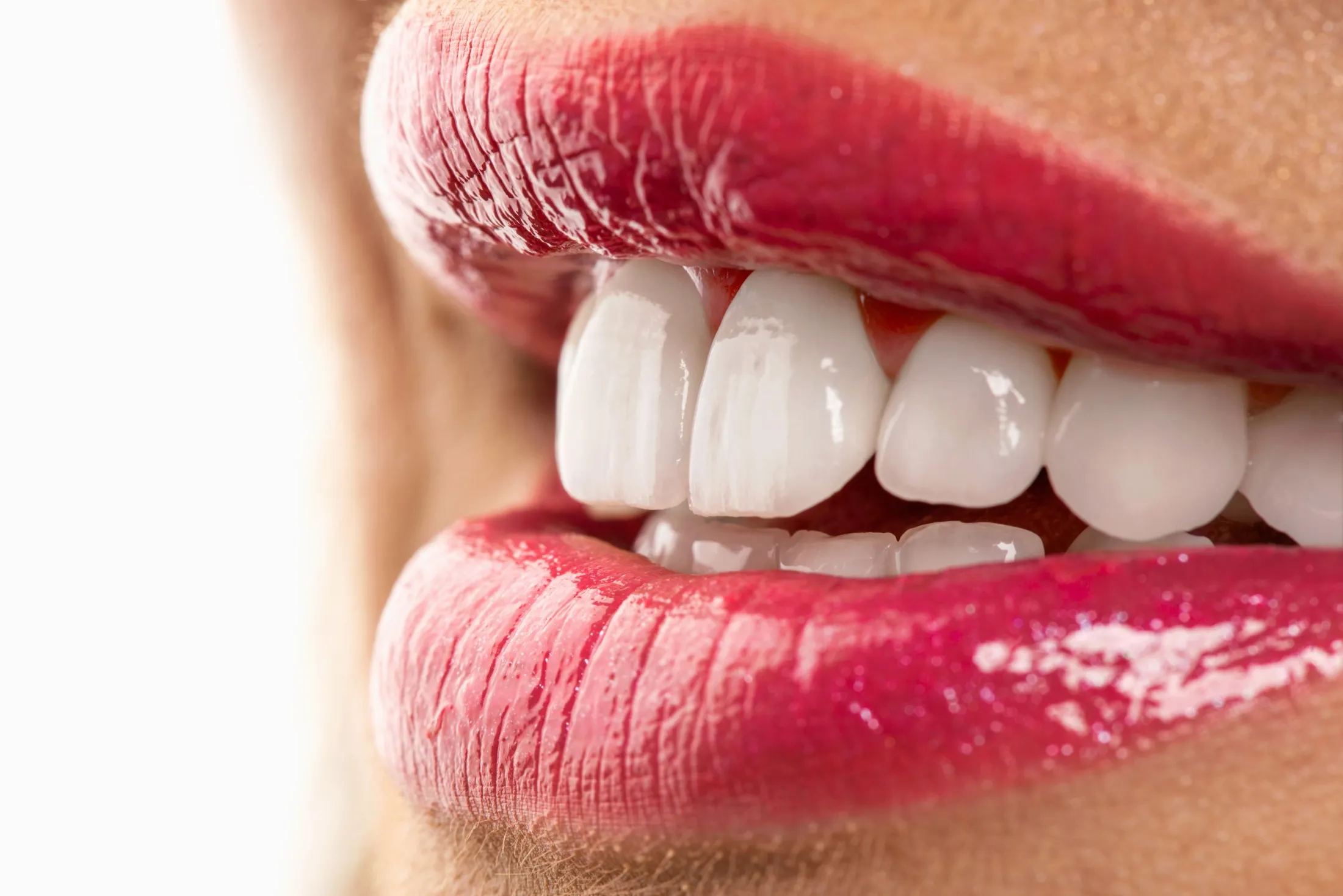 close up of smiling woman's mouth